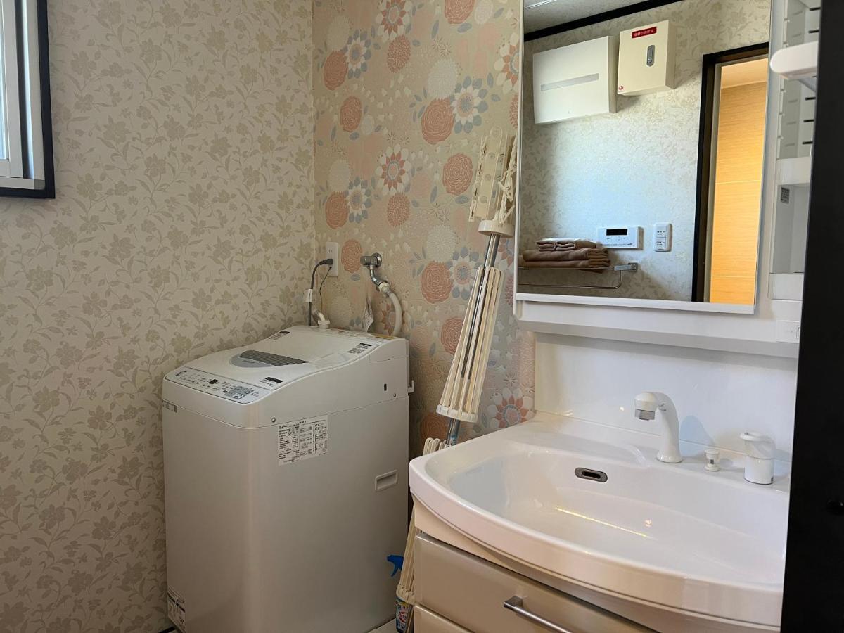 Ocean Front Sumuide Apartment Nago Exterior photo