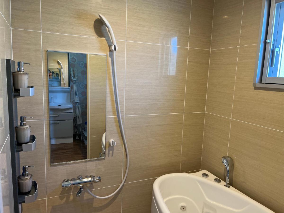 Ocean Front Sumuide Apartment Nago Exterior photo